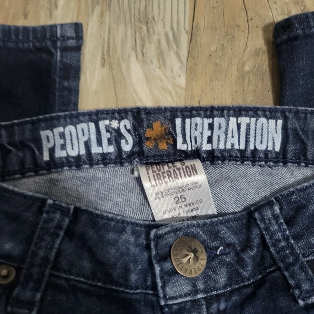 People's Liberation distressed skinny jeans size 25 with star pockets